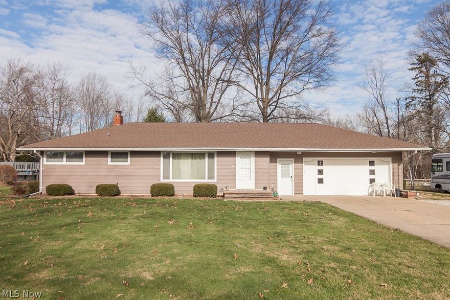 Carlisle Twp ranch nestled on a lovely 102x141* lot! Great curb appeal with recently painted exterior & newer roof (2013)*. Furnace (high efficiency)& central replaced 2014.Recently insulated. Foyer area that leads to a spacious living/dining combo. 1.5 Baths- both on main level. Refinished hardwood in the bedrooms. Main bath is updated with beautiful vanity w/granite top & heated tile floor. Kitchen has charming eating area. Full basement w glass block windows & back-up sump pump. Attached 2 car garage. 20x30 patio w/ built in fire pit is great for entertaining. Large attached garage. Insulated storage barn w/ loft. Nestled on a quiet street in Midview School District.