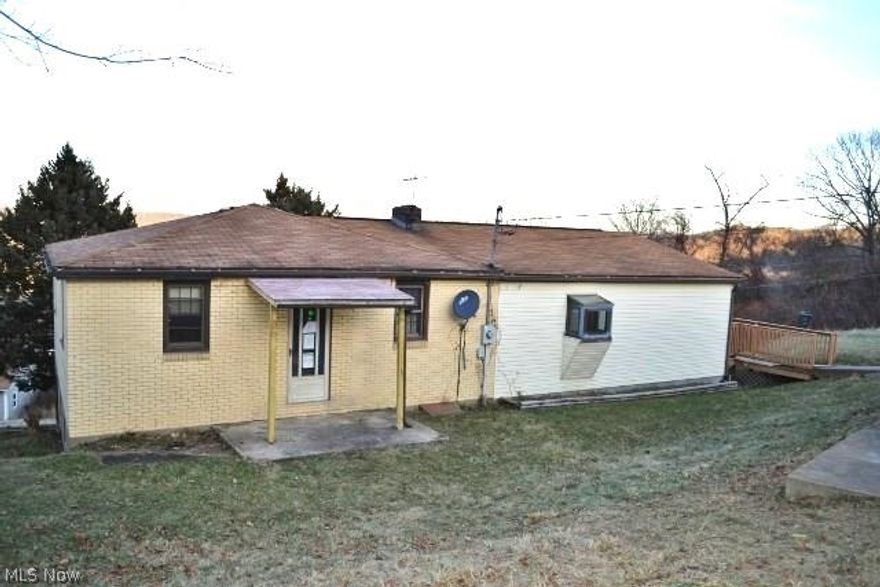 ROOM TO ROAM...on the 2.55 acres of this 3 BR ranch with generously sized rooms.  Updated kitchen, Master bath, 1 car garage and more.  Located in Wellsburg and awaiting your viewing...call today!