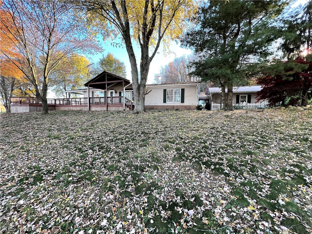 FOR RENT. Ranch style home with 3 bedrooms, two full bathroom, eat-in-kitchen, dining area, living room with wood burner, mud room, breezeway, owner suite, two car garage plus workshop, and a large wrap-around deck. All possible tenants will need to submit a rental application and consent to a background check. The tenant will be responsible for all utilities, cutting the grass, and maintaining the half-mile-long driveway. The driveway requires a 4x4 or AWD vehicle in the winter! This property is suitable for horses (an additional fee per horse will apply).