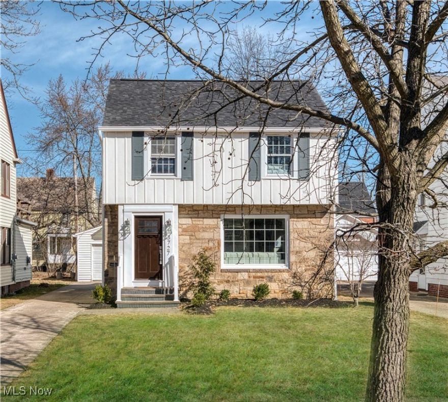 Welcome to this beautifully remodeled 2,000 sq ft home offering the perfect blend of contemporary style and classic elegance in Cleveland Heights. This spacious 4-bedroom, 2.5-bath property features high-end finishes and thoughtful updates throughout, ensuring a move-in-ready experience. The open kitchen is a true centerpiece with white Shaker cabinetry, a stunning quartz island bar, dual sinks and polished nickel accents for a touch of sophistication. Wide plank wood flooring adds warmth across the main living areas, while the designer lighting provides ambiance throughout. The luxurious bathrooms feature marble floors, subway tile, modern vanities, and premium fixtures, delivering a spa-like feel. The home also boasts a finished basement, ideal for a recreation room or home office, and a NEW  HVAC system and water heater to ensure year-round comfort. With updated electrical and plumbing, NEW roof, 2nd floor balcony deck, charming back porch and a detached 2-car garage, this home is primed for modern living. Don't miss out on this turn-key gem in a desirable neighborhood close to parks, shopping, dining, universities and hospitals.  Only 3.9 miles from Cleveland Clinic and University hospital main campuses.