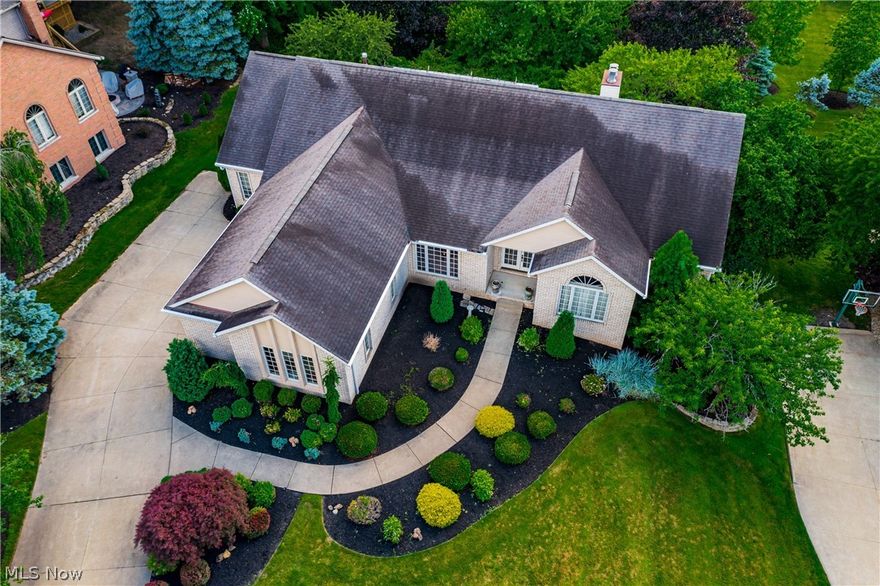 This wonderful brick and cedar Ranch style home was built by Alex Burlas originally as a "Parade of Homes". The open floor plan and abundance of light filtering in will make you feel like you are on vacation year round. Nestled on a beautiful wooded lot in the heart of Nobles Pond you will experience nature and privacy. The unfinished walk out lower level is waiting for your finishing touches and could add another 1,000 square feet to your living experience. The main level boasts a large vaulted Living room/Office, Dining Room, Vaulted Great Room, spacious Kitchen, Large Owner's Bedroom/Bath and two additional bedrooms. This property has so much potential, make this your new home today!