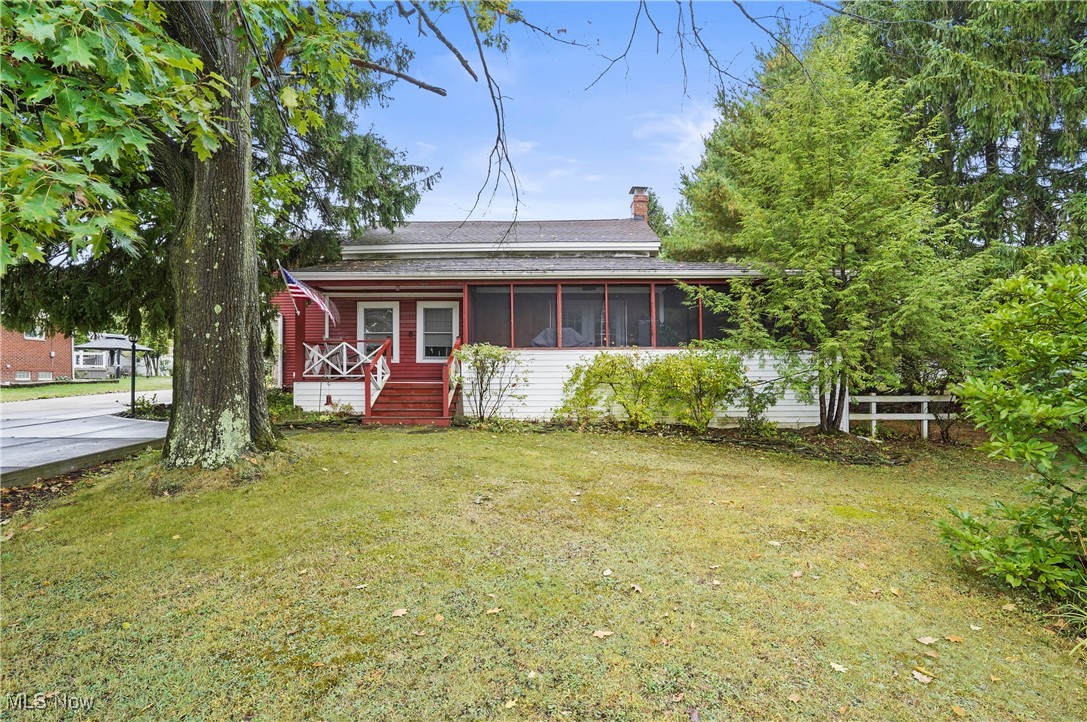 10290 Abbey Rd North Royalton OH 44133 is a gorgeous Century home with 2,142 sq ft including 4 bedrooms, 2 full bathrooms, gorgeous remodeled kitchen with stunning Dining Room looking into the Large Living Room, 24' x 48' traditional pole barn with Loft on large .675 acre lot ! Originally Built in 1853, this gorgeous home was renovated with an effective date of 1962 and then this owner has owned the property since 1986 and lovingly remodeled the entire home as well as added a gorgeous Primary Bedroom Suite & bathroom on the 2nd floor & the Beautiful Mudroom Entry & full bath on the 1st floor therefore expanding the total square footage to the current 2,142s.f. w/ 122' of frontage & 241' deep flat & serene land with public water & sewer services in a wonderful school district of North Royalton. This is the perfect mix of Farm House Chic & Modern Amenities. 1st floor Bedroom & Full Bath make this a great multigenerational living home w/ 3 additional 2nd floor bedrooms & full bath with an awesome Sitting Room to use for hobbies, play or quiet space. The inviting front screened sitting porch & concrete driveway, added w/in past 3 years compliment the exterior as well as the red barn color home siding & rear stamped concrete patio. Additional items updated from this homeowner is the 2014 furnace, converted wood fireplace to gas logs fireplace, kitchen, bathroom, added a bathroom, added a mudroom, & primary bedroom, windows, hot water tank, lots of concrete driveway parking, roof, pole building, additional electric panel, & much more like exposing some of the original timbers, vaulted ceilings, paint throughout have made this a gorgeous home that you'd also be proud to own! This listing includes a one year home warranty paid by the Sellers at closing for your peace of mind in ownership. The proximity to highways for travel and restaurants, shops and schools is awesome! So do not miss this opportunity, call your favorite real estate professional, come see for yourself!