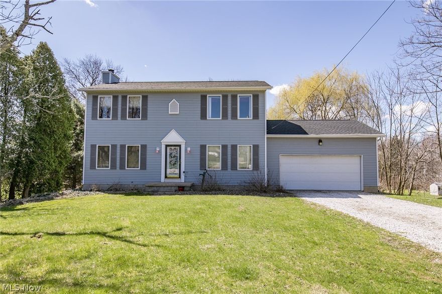 An excellent Tallmadge colonial with 3 bedrooms, and 2.5 baths.  A .9 acre lot is very private.  A walk out basement, newer roof, newer furnace, hard wood floors, and a fireplace are just some of the amenities.