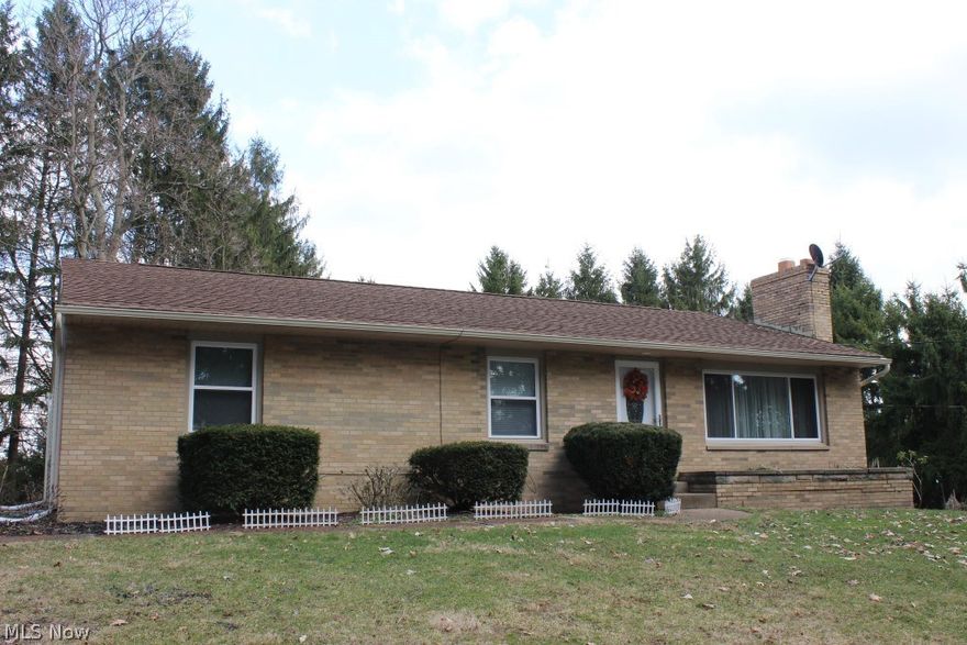 So much to offer in the City of Green* Spacious ranch with 4 bedrooms, 1.5 bath, 1488SF plus 350SF in finished rec room & situated on .82 acres, quiet dead end street* Hardwood floors (except dining room, kitchen & bath)* Living room with stonewall gas log fireplace, full picture window, wood floor & newer beveled glass front door* Dining/gathering room off of kitchen with wainscoting, 2 ceiling fans & 2 walls of windows* Kitchen with breakfast bar & pantry, ceramic back splash, range, refrig, microwave & dishwasher* 4 bedrooms with wood floors (3 with fans) & master with private access to half bath* Breezeway with ceramic floor* Basement recreation room (new carpet (3/17), excellent storage area, shower, glass block windows, double walled with concrete block & glazed tile* Windows & hot water heater (2015)* Shingles, furnace, A/C & humidifier- unable to confirm when updated* Bathroom updated 2015* Clothes chute* 3 car attached garage (2 with openers), newer service door* Home warranty