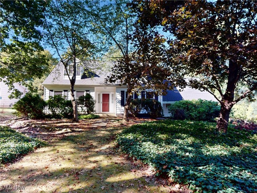 Welcome to your hidden gem, tucked away on nearly an acre of natural beauty! Step inside to a spacious main floor featuring a wonderful eat-in kitchen with hard-surface counters, abundant cabinet space, and all appliances with easy access to the cozy dining room. The dining room boasts a fireplace, built-ins, and French doors that open to the patio, perfect for enjoying stunning backyard views. Just off the dining area is a large living room, ideal for gatherings. A versatile first-floor room which was being used as a bedroom, could serve as a bedroom or home office. The huge back den with access to the back yard, offers serene, picture-perfect views you'll love year-round. Upstairs, you will find three generously sized bedrooms, each offering ample closet space. The master boasts a large walk in closet and personal access to the large bathroom featuring double sinks. Rounding out the home the attached two-car garage and first floor laundry. There is a mudroom between the garage and kitchen and laundry with abundant storage, perfect for seasonal outerwear or even extra pantry space.
Don't miss the chance to make this wooded oasis your own. Bring your personal touches and enjoy the peaceful retreat you've been searching for!