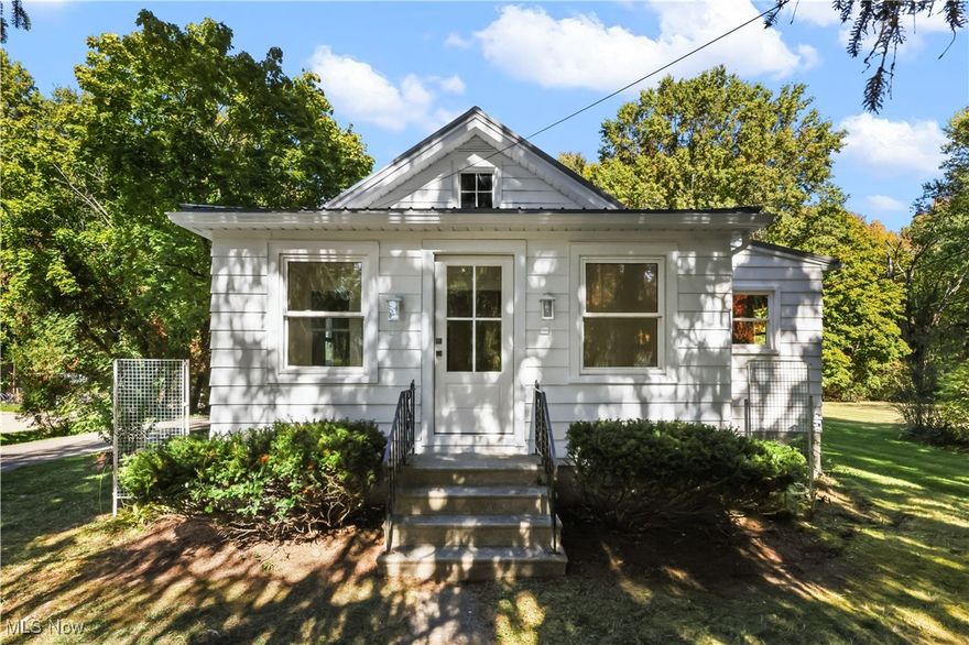 Beautifully remodeled, this lovely home sits in a quiet neighborhood just minutes from Macedonia. Enjoy a large yard with an oversized 2 car garage with carport. Inside, the home has a custom, solid hardwood kitchen with solid brass fixtures, updated lighting, and plenty of workspace for the chef. The bathroom has been completely redone and features a large tub with custom tile, updated fixtures and vanity. Both bedrooms are super spacious with large closets. New flooring, mouldings, doors, fixtures. Backup generator and gas line has been ran to the house.