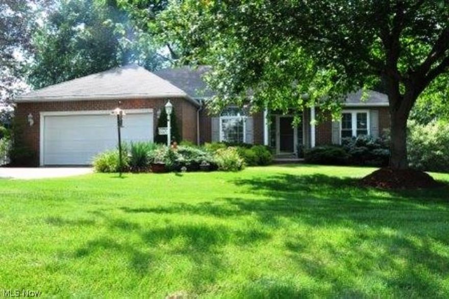 Luxurious ranch style home in Colonial Hills allotment, surrounded by a white picket fence. The property offers 3075 square feet of luxurious living space. Finished walk out lower level offers custom made Amish cabinetry and gorgeous lighted display cases. Exercise/playroom has customized rubber flooring, mirrored wall, and full bathroom. Endless possibilities. Upstairs has ceilings trimmed in amazing oak crown molding, eat in kitchen all new appliances, new high energy efficient windows including quarter and half-moon accent windows transferable lifetime warranty includes labor. New high efficient furnace, A/C, whole house humidifier and water softener. The home offers amazing craftsmanship in every square foot that maximized available living space. This is a must see! Don't miss out on a once in a lifetime dream home!