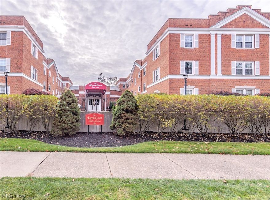 Tremendous Value in this Gem of a unit in the Royal Court building! Freshly painted with easy to maintain laminate flooring throughout. Light and bright living room opens to a sizable dining room in "L" shape for easy entertaining. Newer windows (4-5 years) throughout offer plenty of sunshine! Eat-in kitchen with recently (2 years) installed granite counters and tile backsplash, updated cabinets and newer lighting. Refrigerator and range both approximately 5 to 6 years old. Lots of storage and room for a table and chairs, with access to hallway. Large master bedroom has dual closets with ample storage, and updated en-suite half bath. Second bedroom, being used as a den, also has large closet. New (2023) updated hall bath has shower over tub. Window AC units 2 years old. Steps from the new Van Aken District shopping and dining area. University Circle and Downtown CLE just an RTA Rapid ride away! Must see!!