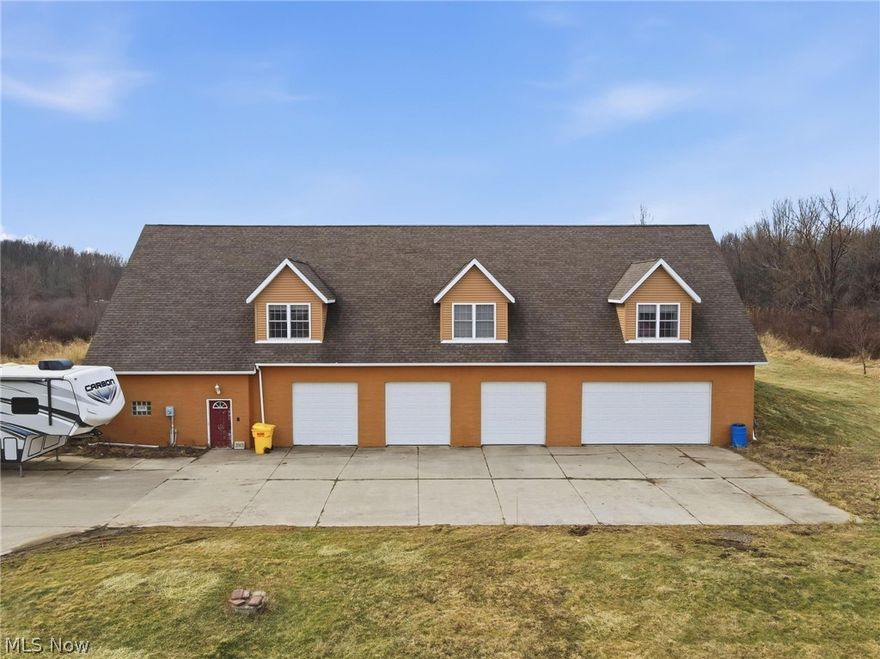 Welcome to this one-of-a-kind barndominium retreat tucked away in desirable Saybrook Township —just minutes from the beautiful shores of Lake Erie!

Built in 2006 and set on 6.71 private acres, this impressive 3,620 sq. ft. property offers the perfect blend of functionality and country charm. Sitting approximately 250 feet off the road with a long concrete driveway, you’ll love the peace, privacy, and true country setting.

Garage Lover’s Dream!

The first level features an incredible five-bay garage that is extra deep—large enough to accommodate up to 10 vehicles. Whether you’re a car enthusiast, small business owner, or simply need room for all your toys, this space delivers. You’ll also find:
Dedicated workshop area,
Convenient half bath, &
Endless storage potential.

Head upstairs to the main living quarters where you’ll enter a bright, open, and airy home featuring:
4 generously sized bedrooms,
2 full bathrooms,
Expansive living spaces perfect for entertaining, and an
open layout with room to grow.

Additional highlights include:
Public water + septic system,
New hot water tank (2025, &
New central air (2023)

If you’ve been searching for a property that offers space, privacy, versatility, and proximity to the lake—this is it. Whether you’re looking for a personal retreat, hobby space, or the ultimate garage setup with living quarters above, 3913 Ninevah Rd. checks every box.

Country living at its finest—yet close to everything Ashtabula has to offer.