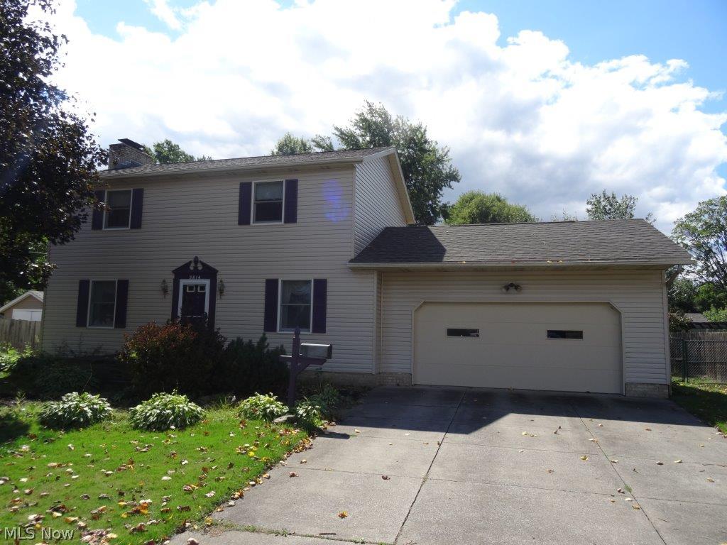 Great opportunity in Mogadore! Convenient location close to the center of town. Spacious newer colonial, large flat fenced in yard, deck, 2 car att garage, and full partially finished basement. Open eat-in kitchen, living room with fireplace.