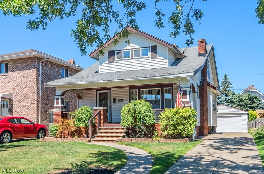 4 bedroom, 2 full bath Cape Cod in Garfield Heights.  Beautiful woodwork gives this home a sense of charm.   You will be greeted with a front porch to enjoy your morning coffee or evenings relaxing. The living room boasts a fireplace and built-in bookshelves.  The dining room has china cabinets and a bench for additional seating.  Flowing from the dining room into the updated kitchen where you will find stainless steel countertops and appliances (that stay) and tons of cabinet space.  Access to the fenced in yard and concrete patio is off the kitchen.  Two bedrooms and a full remodeled bath complete the first floor.  Upstairs is the master bedroom with walk-in closet and an additional bedroom.  The finished rec room (34x11) has plenty of room for entertaining and a workshop area as well.  Updates include: furnace, front porch rebuild (2015), garage and hot water tank (2012) tear off roof (2003) and electrical panel (2009).  Home warranty is included with this property.  Call today to s