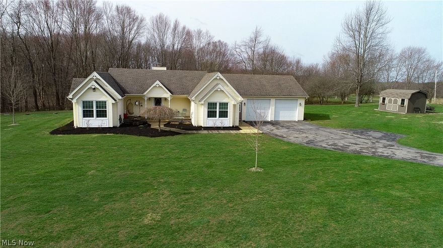 Privacy abounds this meticulous ranch home on nearly 6 acres. The open concept main level of this house plays host to a spacious great room with gas fireplace; a gourmet kitchen with stainless appliances; a master suite with full bath; two additional bedrooms; laundry room, and a full bath.  A near fully finished basement adds a huge recreation room and a bonus room that can be used as a fourth bedroom or office.  Updates include fresh paint, hardware, refinished tub, engineered vinyl plank floor in kitchen and great room(2017), carpet in bedrooms and playrooms(2019), furnace(2010), A/C(2017), roof(2010), all windows except sun room(2010), HWT(2017), and shed(2015).  Exterior features include an oversized 2 car garage, shed, rear patio and built in swimming pool.  This home is in move in condition and protected by a seller paid 12 month home protection plan.  Call today!!