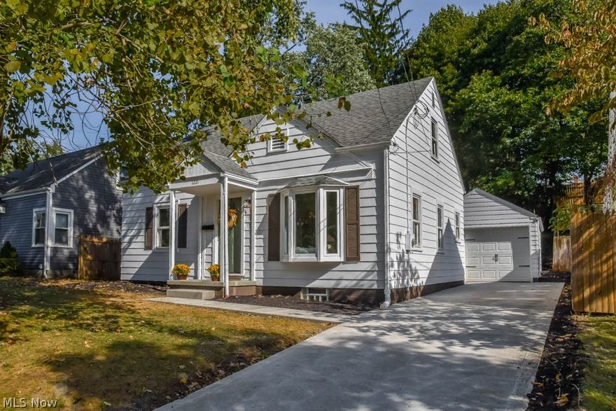 Charming 3 bedroom home with a finished lower level! Filled with updates including all new flooring, fresh paint inside and out, new driveway, new furnace, A/C, hot water tank, electric panel and more! Crack open your cookbook in the beautifully redone kitchen with butcher block counters, stainless steel appliances and white cabinetry. Gather in the front living room with a bay window. The master bedroom occupies the entire second level with a super deep walk-in closet and wide hallway perfect for a desk or dresser. There are 2 additional bedrooms on the main level as well as an all-new full bath with tile shower surround, new light fixtures and vanity. Extra living space on the finished lower level with a large rec room! The backyard offers a brick patio and an oversized 1-car detached garage. Move-in ready home - don’t miss out!