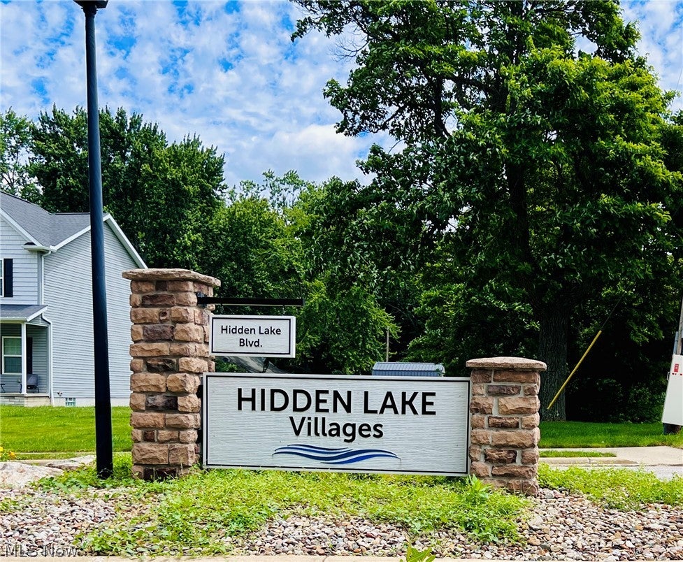 Photo of 1112 Hidden Lake Boulevard, Akron, OH 44312 (MLS # 5219975)
