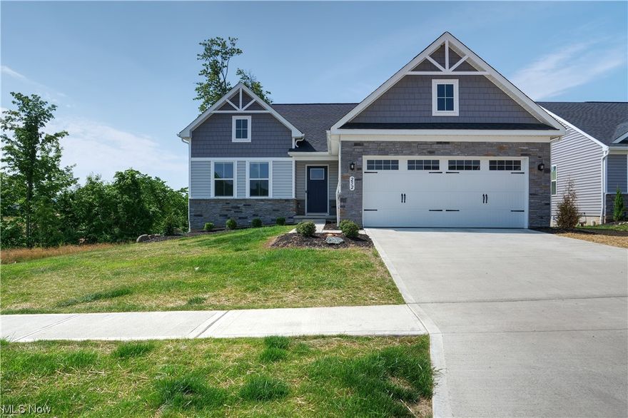 Welcome to 252 Boone Trl, located conveniently off I71 and I76; this newly constructed low maintenance (Landscaping and snow removal included) ranch is one of the only few that have a walk-out basement 10x38 concrete patio, and an elevated covered 10x14 deck off of the dining area overlooking a pond and trees. The property lot is located next to tree-lined steam, which is excellent for privacy. Pulling up to the property will notice the Modern feel with a decorative rock to the windowed two-car garage. Entering the foyer, you have a full bath and two bedrooms up front. All rooms are wired with their very own fiber internet and cable TV available from multiple providers.. and have controller fans in all the bedrooms. A very open floor plan flows to the family room, dining and kitchen. Led lighting throughout and double-hung windows clean from the inside. The kitchen offers a large island with cabinets, electrical outlets, quartz countertops, slow-close draws, and slow-close cabinets. First-floor laundry room by the large master bedroom and master bath with his and her sinks, walk-in closet, and an upgraded shower with bench. The full basement is plumbed for the bathroom and is awaiting its design. Set up your private showing today and see what this property has to offer.  No need to wait 6-8 months to build when you can buy this fully upgraded ranch and move right in. Contact agent for pdf file showings prices of additional upgrades included.