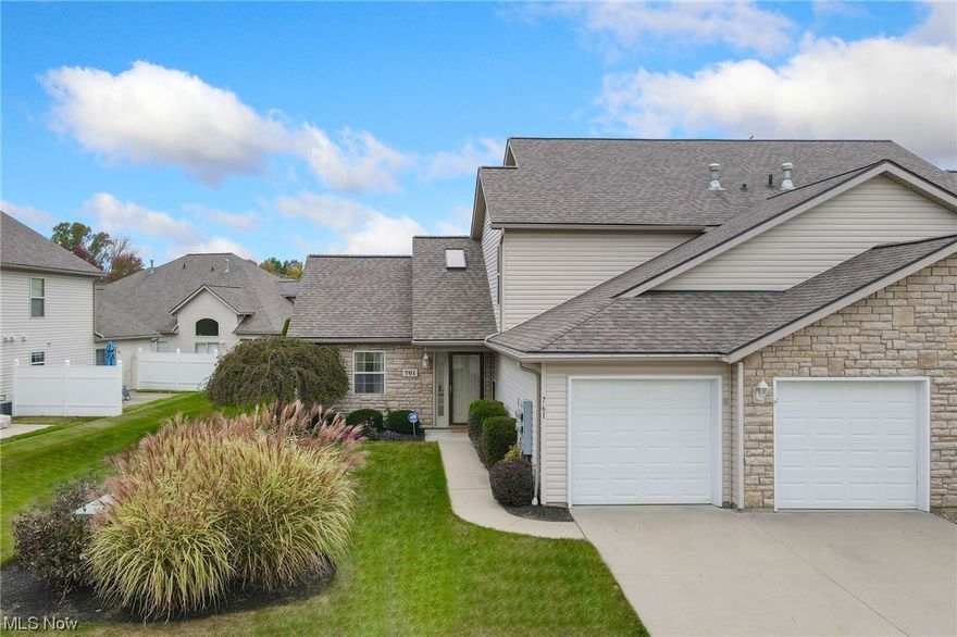 Great curb appeal in this beautiful, 3-bedroom, 2-bath end unit with 2-car attached garage, meticulously maintained by original owners in Pleasant Lakes subdivision. Spacious, main-level Bedroom and Full Bath offer convenient, one-floor living option! Prime location is just minutes from parks, schools, downtown Kent, KSU and NeoMed, with easy access to I-76. Open floor plan provides relaxing flow. Great Room, with skylight and soaring vaulted ceiling, is filled with natural light and anchored by lovely, gas fireplace with flush hearth. This warm and welcoming space leads to Dining Nook and large, fully applianced Kitchen with eat-in breakfast bar and plenty of cabinetry, pantry storage and additional counter space for all your cooking projects. Sliders provide access to backyard patio and garden for everyday enjoyment and easy entertaining. Laundry/Utility Room, with washer, dryer, service sink and mechanicals, completes first floor. Upstairs, you’ll find Primary Bedroom with vaulted ceiling and two large closets (the walk-in closet is huge) plus spacious Bedroom 2 and the shared Jack and Jill Bath. Entire home has been freshly painted throughout (2023). Additional updates include backyard patio (2009), supplemental privacy fencing (2010), lush landscaping including trees, shrubs, perennials (2007–2023), and newer hot water tank (2022). Home Warranty included. Community Amenities: pond and walking trail. This wonderful home is a must-see! Schedule your private showing today!