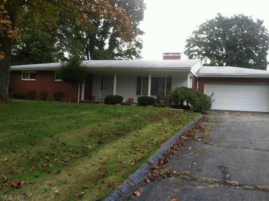 4 bedroom, 2 full bath brick ranch with 2 fireplaces on 10 ACRES!!!  Finished rec room, bedroom and full bath in basement.  2 car attached garage.    HOME WARRANTY INCLUDED!  Taxes based on Homestead reduction.