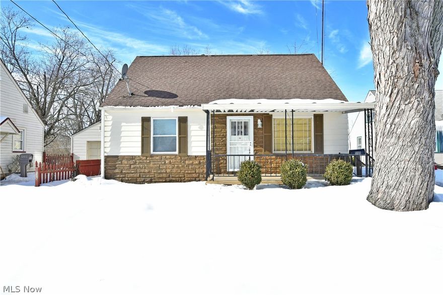 Freshly renovated and move in ready, this lovely Warren Cape Cod brings a surprising four-bedroom layout with two full baths! The picturesque residence boasts plenty of charm as the inviting exterior stands out against the bright snow, highlighting tasteful brickwork and thoughtful landscaping. A detached garage runs along the ample backyard while the rear teases spring with its fenced in patio space. Step inside to find gorgeous hardwood flooring that fills the sunbathed living room where a large picture window resides. The main hall brings built in cabinetry as it divides the pair of first floor bedrooms. The engaging full first floor bath delights with a tile lined tub and shower, paired with the dark stained vanity. A robust kitchen completes the floor with plenty of room for casual, eat-in dining. Up the carpeted stairwell, two additional bedrooms branch away to reveal carpeted living space and personal closets. Below, the sealed and painted basement brings an additional full bath