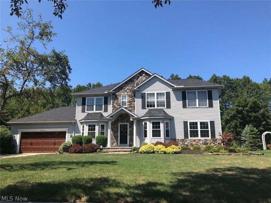 WOW! private enclave nestled in Avon, near Westlake and North Ridgeville enjoy the sunsets from this back patio with a view of the tree line and spacious level landscaped yard. Enter through the foyer flanked by the dining room and living room with built-ins and fireplace. Travel past the staircase into the family room with a second fireplace that is open to the kitchen featuring a dining area and a breakfast bar all with views of the private back yard. Also on the main floor you will find a laundry and half bath. Up the stairs to the three generous bedrooms hall bath and the owners retreat. Down the stairs to the finished basement with newer furnace and mechanical s. This home is a blank canvas for you to make your own!!