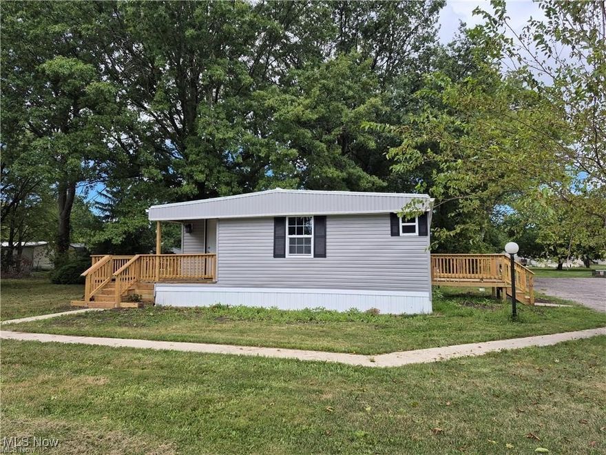 Step into comfort, flexibility, and peace of mind in this completely remodeled 4-bedroom home in West Ridge Green. The spacious, open floor plan welcomes you with a fresh, modern feel, while the private in-law suite with its own entrance offers the perfect solution for multi-generational living, guests, or a quiet home office. Every major update has already been done for you—new flooring, lighting, windows, a beautifully updated kitchen and baths, new appliances, a new furnace, and a tankless hot water tank—so you can simply move in and enjoy. Unwind on the wrap-around side deck accented by outdoor lighting, ideal for morning coffee or evening gatherings, and take full advantage of the community amenities that make life here easy and enjoyable. This is more than a home—it’s a place where everyone has space, comfort, and a sense of belonging.