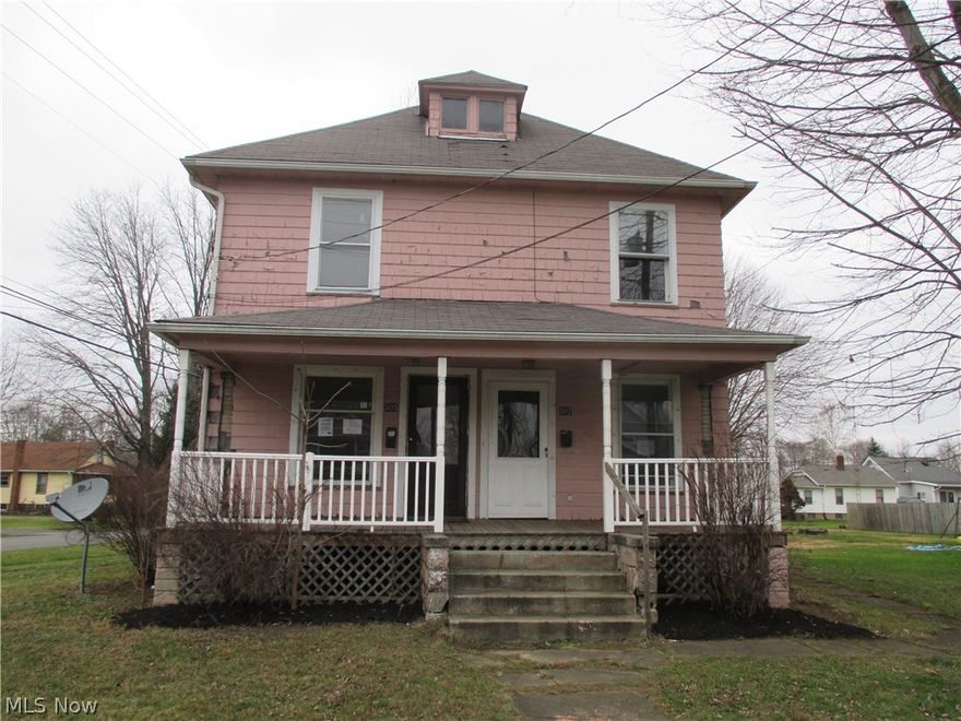 Two story duplex with side by side units...each with 2 bedrooms.  Both units also have living room, dining room, kitchen and full bath...both units also still have some natural wood work remaining.  One unit could be lived in while you rent the other one or use as an investment property and rent out both sides.