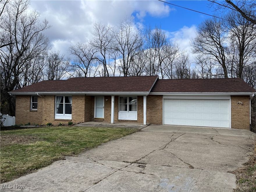 Welcome to this charming and spacious 2,516 sq ft ranch home, nestled at the end of a quiet cul-de-sac. Enjoy privacy and tranquility with a large 20 x 8 deck in the back, perfect for outdoor relaxation. The kitchen boasts beautiful oak cabinetry and a convenient pantry. Adjacent to the kitchen, the dining room features a classic chair rail, adding a touch of elegance. The primary bedroom offers ample storage with a triple closet, laminate flooring, and a private bath. There are three well-sized bedrooms on the main floor, along with a fourth bedroom located downstairs. The main floor is fully equipped with laminate flooring throughout for a cohesive and modern feel. Downstairs, a spacious family room with sliding doors opens to a covered patio, providing easy access to the backyard. This home also features a large 2-car attached garage, adding extra convenience. Make this delightful home your own!