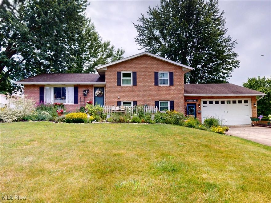 Welcome to your dream home in the highly sought-after Lake Harmony subdivision, where everyday living feels like a getaway. This vibrant lake community is centered around the scenic, 30-acre Lake Harmony, offering two private beach areas for swimming, as well as a boat dock perfect for jet skis and boating adventures.

This spacious split-level home blends comfort and style with recent updates throughout, including new stainless steel appliances, a new furnace, water softener, updated windows, hardwood floors and carpeting, as well as new door hardware and faucets.

Enjoy entertaining in the large custom kitchen featuring Corian countertops, a generous center island, and an open flow to the dining room and living spaces. Cozy up by the wood-burning fireplace with blower in the expansive family room, or step outside to relax on the deck or brick patio overlooking professionally landscaped grounds.

With a thoughtful layout, modern upgrades, and an unbeatable location, this home offers the perfect combination of privilege and peace in a true lake community.

Don't miss this rare opportunity to own in Lake Harmony, where lifestyle meets location.