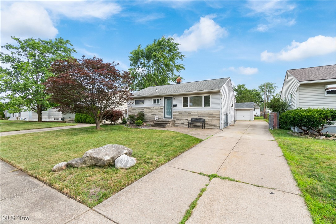 Check out this fully updated ranch home in Brook Park! This home features beautiful original hardwood floors throughout most of the first floor. The large living room has plenty of natural light and flows into the recently remodeled kitchen w/quartz countertops. A formal dining room (that can easily be converted back to the 3rd bedroom if the buyer requests), 2 bedrooms, and full bathroom round out the main level. Head downstairs to find a HUGE finished recreation room, additional full bathroom, laundry room, and a unfinished area for storage. Fully fenced in rear yard w/an awning covered patio, 2+ car detached garage, and storage shed. Close proximity to 71, Cleveland Hopkins International Airport, and the future Cleveland Browns Stadium Complex. Schedule your private showing today!