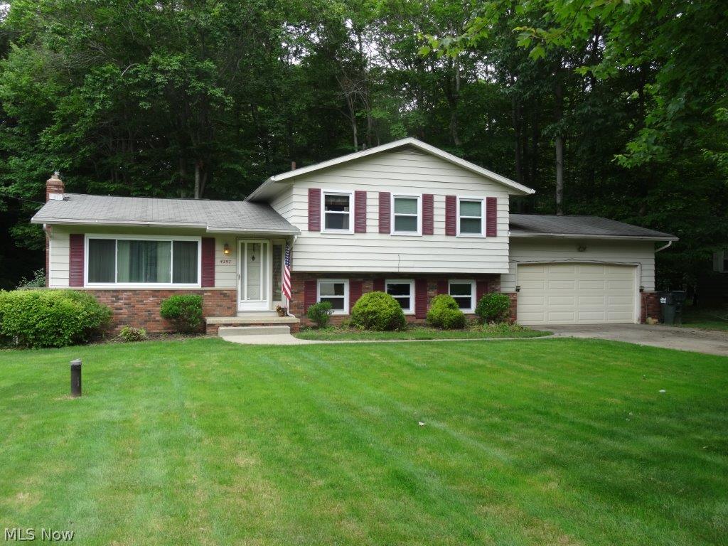 Extremely well maintained home in the desirable Highpoint Acres allotment. You will love this spacious split, the main floor features a bright living room, formal dining room, functional kitchen with all appliances and eating area. Upstairs you will find hardwood flooring in 3 good sized bedrooms, 2 full baths (one upper, one lower), lower level rec room + office. Major updates include: central air 2014, Carrier furnace, and windows! 2 car attached garage, and extra storage in basement w/laundry area (washer/dryer are included). Nice private wooded yard with deck, quiet no-outlet neighborhood.