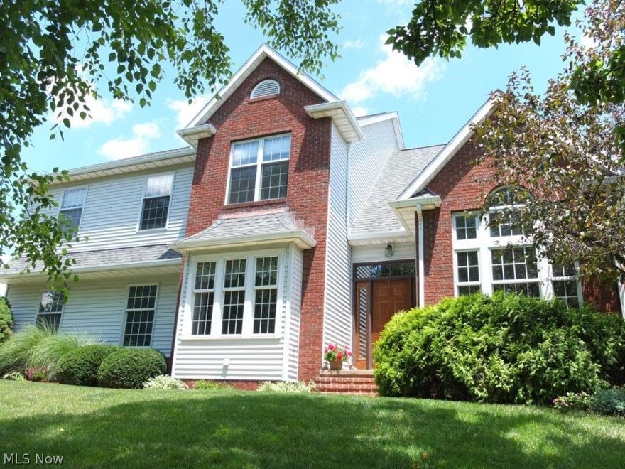 Gorgeous custom built 4 bedroom, 3.5 bath home with stunning finished lower level and fantastic master suite! Open first floor has a 2 story foyer, living room and great room with wood burning fireplace and an abundance of natural light with Pella windows. Huge fully applianced kitchen with breakfast bar, pantry, custom Amish cabinets and large dinette. First floor laundry and half bath on main level, very convenient. Spacious master suite has a private full bath with jetted tub, updated tile shower, dual sink vanity, linen closet and walk-in closet. 3 additional large bedrooms and huge full bath with dual sink vanity. Finished lower level offers an office/5th bedroom, open rec room with wet bar, full bath and wonderful media room PLUS multiple storage rooms. Expanded 2 car garage has lots of extra storage and workbench. Home is nicely treed and has a great deck with swing, a sprinkler system, invisible pet fence, new furnace and A/C in 2015 and roof in 2008. Great location on quiet cu