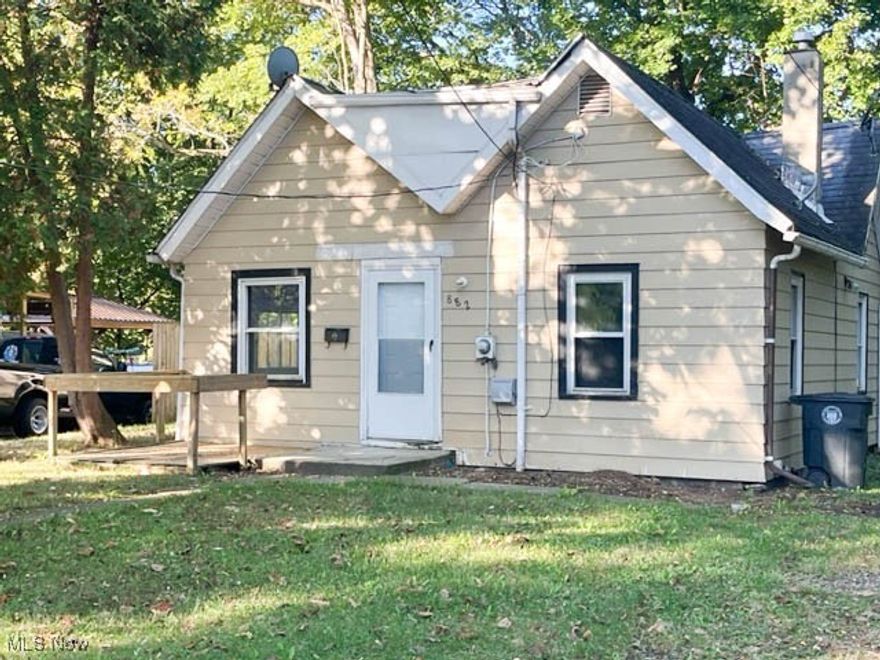 Investor special in Akron! This 2-bedroom, 1-bath home on a generous 0.32-acre lot has been recently cleaned out and is ready for your renovation vision. Carpet has been removed, leaving a blank slate to reimagine every room. At 1,075 sq ft, the home offers solid bones and a simple layout—ideal for adding value. With strong rental and resale potential, this is a prime opportunity for investors looking to build equity through rehab. Don't miss your chance to bring this property back to life!