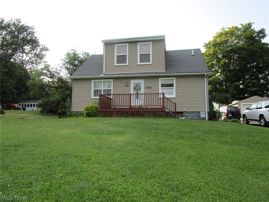 Reduced! and it won't last long! Move in ready w/ a bright sunny kitchen, plenty of counter / cabinet space, & a handy snack bar just perfect for your cookbooks, extra serving space & additional dining space. LR is open & roomy, & the guest bath is handily located on the 1st floor. Both smaller bedrooms have nice sized closets - the HUGE master BR on the 2nd floor has plenty of closet space, as well. Handy 6x11 landing at the top of the stairs makes a nice spot for a small office, nursery or homework spot. The basement has 2 finished rooms that would be perfect for a family room, exercise area, home office or an additional bedroom. The Water heater, Furnace, AC, siding, shingles, kitchen cabinets, counters, floor coverings & light & plumbing fixtures were all replaced in 2011, per the former owner. Laundry hookups are in the basement & there's plenty of additional storage space. Outside, the paved drive leads to not 1...but 2! detached garages. 18x18 on the smaller & 48x20 on the larger, w/ plenty of room for vehicles, work benches, storage, outside equipment, mowers, etc.. This house sits well back off the road, & runs super deep for plenty of privacy by the AG pool & play areas. Nice back patio is a quiet private spot for grilling, entertaining guests or sipping a morning or evening beverage. City water, LOW taxes, high speed Internet via Spectrum & a potential 2000 right of way payment (ask your agent for details) round out the deal on this adorable sunny Cape Cod!