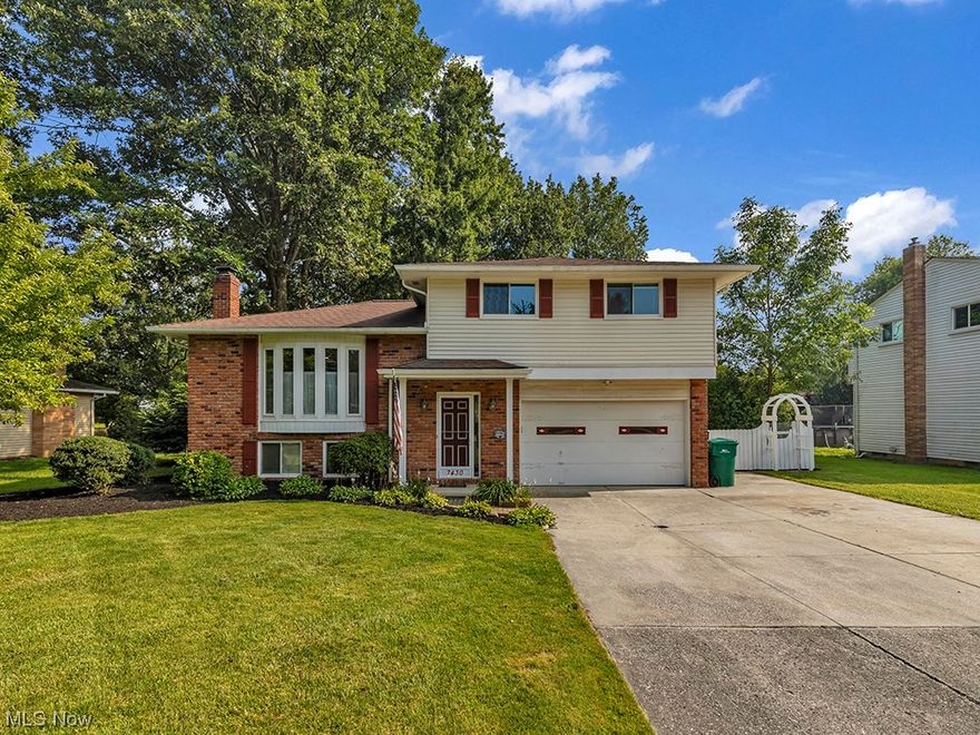 Beautiful Split Level on a Cul-de sac street in Mentor! 3 bedrooms; 1.5 baths. Front entryway has been remodeled with Wainscoting and a built-in storage space with hooks to hang your coats or bookbags. The upper level features a large living room with floor-to-ceiling windows. The spacious eat-in kitchen with all appliances staying including a refrigerator, stove, dishwasher and microwave. Sliding glass doors off of dining area opens to the deck and patio. Fully fenced in private back yard with Shed. Sunroom in the back of home for privacy and relaxing has heat and air conditioning. Upstairs you will find three nice-sized bedrooms and a full bath. On the lower level, a family room with gas fireplace and a laundry room with ample storage. Washer and Dryer can stay. Gutters, Hot Water Tank, Electrical Box and Sump Pump replaced in 2018. 2+ car attached heated garage. Central Air, Aprilaire Humidifier. Nicely landscaped yard. Great location near shopping, parks, and the freeway.