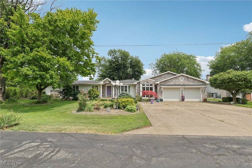 LAKE ERIE VIEWS!! This quality built ranch home is just steps from Lake Erie and is beckoning you to live the LAKE LIFE and enjoy all that lake living has to offer! Enjoy amazing views at the end of the private street. You'll love the quality details of this home with its sprawling open floor plan, its large chef's kitchen featuring newer stainless appliances, a large island and custom cabinets all open to a spacious dining area for entertaining. An abundance of windows provides plenty of natural light and beautiful views of the completely fenced in backyard with mature trees, flower gardens, an arbor and a large deck to enjoy the lake breezes. There's an oversized 2 car garage, an additional 1 car garage, and even a shed for plenty of storage and lake toys! Generac generator for peace of mind and newer mechanicals, this home has been very well maintained. Make this your forever home, your vacation home, or an income producing investment with no restrictions or license needed for transient rentals. Easy access from Route 2 and just a short drive to Cedar Point, Old Woman's Creek Nature Preserve, marinas, restaurants, parks and so much more!