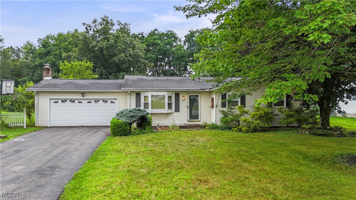 Welcome to 1045 N Columbus Circle where comfort, space, and style come together in this beautifully maintained ranch home in the heart of Ashland! This 3-bedroom, 2.5-bath home offers a spacious finished basement with a built-in wet bar, perfect for entertaining or relaxing. Step inside to find an inviting layout with a large living room, a cozy dining area, and an updated kitchen with ample storage. The main level features three generously sized bedrooms, including a primary suite with its own half bath. Downstairs, the finished lower level offers a second living space, full bath, and a custom wet bar that's ready for game nights or movie marathons. Outside, enjoy a private backyard with mature trees and plenty of room for outdoor gatherings. Located in an established neighborhood just minutes from downtown Ashland, local parks, and schools-this home checks all the boxes. Don't miss your chance to make this move-in ready gem yours! PLEASE ALLOW 48 HOURS for response to any offers
