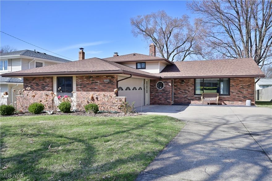 Check out this loved split level home in a prime location of Fairview Park! This beautifully updated and maintained 3-level split offers over 2,000 sq. ft. with 3 bedrooms, 2 full baths.  As you walk through the front door, the open living and dining area boosts vaulted ceiling and lots of natural light. The kitchen features Stainless steel appliances and many updates.   Upstairs find 3 large bedrooms and a full bathroom with access through the master bedroom.  The lower level has a cozy family room with a gas fireplace, newly remodeled full bath, spacious laundry room, and second access to the backyard. Additional highlights include, two-year old roof, an oversized 2-car attached garage, lots and lots of storage, and newer flooring throughout. 21500 Nottingham is located near so much-The Cleveland Metroparks, scenic trails, and g, with easy highway access and minutes the airport, and downtown. Don’t miss this move-in-ready home!