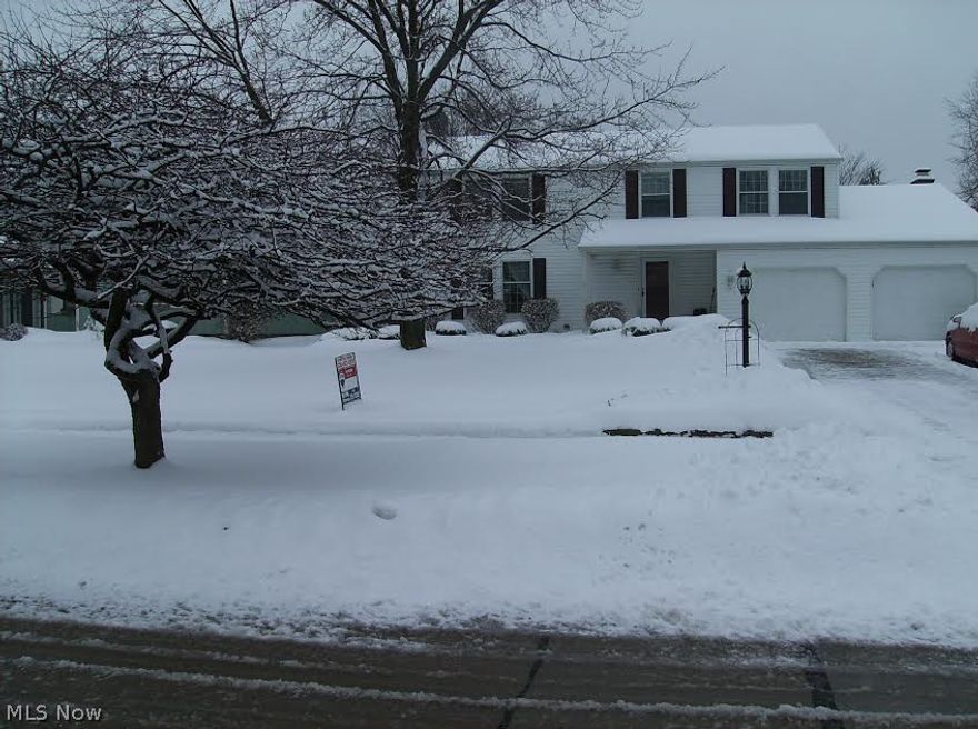 Minutes away from dining and shopping, this beautiful colonial rests in a quiet neighborhood and boasts a huge kitchen that opens up to the dining room. If you like the outdoors, this home is for you! The backyard is completely fenced in and features a multi-level deck that includes a hot tub and lots of extra space for entertaining! The community party center and pool is just a stone’s throw away and is available by reservation to the community residents! Bedrooms have been freshly painted and master bedroom showcases a walk-in closet. Newer roof-siding-gutters in 2011, newer appliances 2012. Pool table in the basement stays.