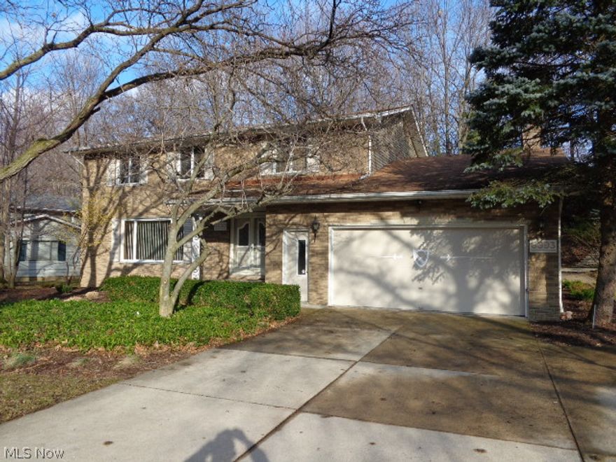 Large 5 bedrm home sitting in Bramblewood Estates hidden away on a cul-de-sac street. Formal living & dining rms, large eat-in kitchen w/new wood floor. Hallway, dinette, & family rms have beautiful Terrazzo floors. Marble fireplace in family rm. Patio off family rm. 2nd Floor has all hardwood floors & 2 full baths. Half bath on main floor. Full bath in basement. 2.5 Car attached garage, central air, gas heat, brick exterior. One-owner home shows very well. City rec area, pool, shopping, close to I-77. Newer boiler & newer central air.