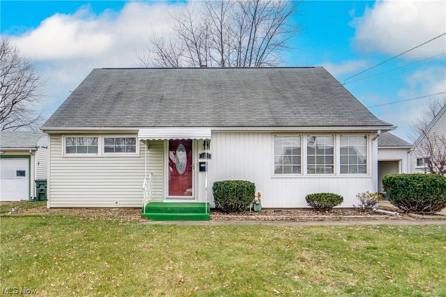 Welcome to this charming bungalow nestled on a quiet dead-end street. As you step through the front door, you are greeted by the warmth of the spacious living room adorned with gleaming hardwood flooring and bathed in natural light pouring through large windows. Adjacent to the living room, the updated eat-in kitchen beckons. Dark cabinetry contrasts with formica countertops, while the tile flooring adds a touch of practicality. The dining area provides a perfect spot for entertaining guests. On the main floor, two bedrooms await, each featuring the same hardwood flooring that graces the living room. The updated bathroom on this level boasts tile flooring, a jetted tub with a shower, and an updated vanity. Ascend the stairs, and you'll discover the third bedroom, with plush carpeting. An additional bonus room provides versatility, serving as convenient storage or could easily be finished for a fourth bedroom. The basement, though unfinished, adds valuable space and convenience with a half bath. A one-car attached garage, complete with openers, ensures convenience for parking. Outback is a fully fenced-in yard, complete with a charming patio. This home's location is unbeatable, just minutes away from shopping, parks, and schools. Schedule your showing today!