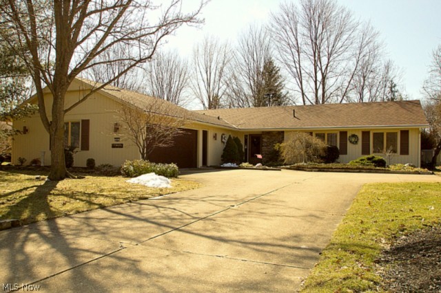 Welcome home to this wonderful ranch in Meadowood! The new vinyl siding & lush landscaping boast great curb appeal! Sprawling great room w/ fireplace & bright skylight. Updated kitchen w/ newer granite counters, pergo floors & cabinets. Huge pantry, breakfast bar & planning desk. Slider door leads out to the peaceful park-like yard. Relax in the cozy family room. Master retreat w/ walk-in closet, en-suite bath & access to private deck. Two additional bedrooms & 2nd full bath. Large laundry room w/ ample cabinet space. New leaf guard gutter system for easy maintenance. 1 year home warranty! Community amenities offer a pool, club house, walking trails, basketball & tennis courts & much more! Conveniently located near interstates, shopping, schools & Metro parks!
