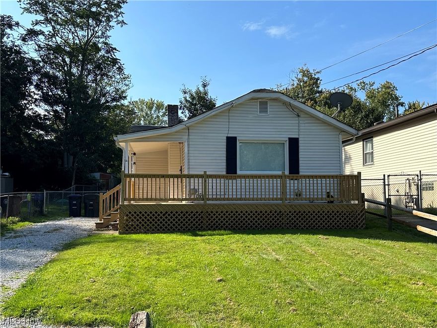 Price reduced and seller states "Make an Offer"!!  Move right into this renovated home on a cute, quiet, dead end street! This adorable bungalow comes with a full fenced in back yard and a fabulous wrap around front deck! Enter from the side to a living room and dining room area, with all new paint and flooring. Continue to the kitchen with all new cabinets and flooring as well! The main bedroom and the 2nd bedroom both come off the kitchen area. Downstairs is a super clean basement that has an older style toilet and shower. Once upon a time, there were bedrooms downstairs, but the current owner cleaned it up and is letting the new owner decide what to do.  The roof is estimated to be roughly 13 years young. The furnace is somewhere around the same age and the current owner just had it cleaned and serviced.  Driveway is gravel and some new gravel was recently brought in as well.  If you want this for a rental income property, or for owner occupancy, it will be a great home at this value!!!