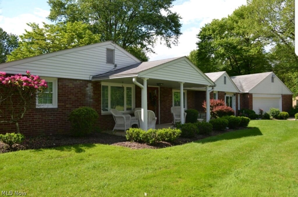 Beautifully cared for brick ranch on private 7.4 acres* A rare find in City of Green* This one owner home offers 3 bedrooms, approx. 1961SF, 2 fireplaces, updated bathroom & updated windows (2011)* Family room with built in cabinets, desk & gas log fireplace with remote* Formal dining room* Living room with wood burning fireplace* Eat in applianced kitchen with refrig, range, dishwasher & microwave* 1st floor laundry* Mud room* Covered front porch* Oversized attached 2 car (approx. 26x29)* 1300SF pole building with concrete floor* Acreage is wooded; approx. 470x812* Park like setting on dead end street* Building limitations* Home warranty provided*