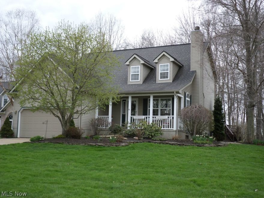 Immaculate Woods of Burlington Home featuring exquisite detail with custom upgrades including granite counter tops, crown moulding, custom design transom, custom window treatments.  List of upgrades available from Lister.  Walkout basement w/ patio includes bonus bedroom & half bath. Enjoy park like view from multi-tier deck.