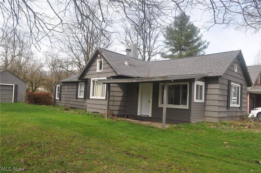 Discover the charm and potential of this Peninsula Valley retreat, set on nearly an acre of scenic land in one of Northeast Ohio’s most sought-after locations. This 2-bedroom, 1-bath home sits on a quiet dead-end street, offering privacy and a peaceful setting. The backyard borders the Cuyahoga River and provides beautiful winter views of the Boston Mills ski slopes.
Ideal for outdoor lovers, investors, or anyone looking to build their dream home, this property offers unbeatable access to the Cuyahoga Valley National Park, Metro Parks, the Ohio & Erie Canal Towpath Trail, and an abundance of hiking and biking paths. Just minutes away, you’ll find downtown Peninsula, Szalay’s Farm & Market, local dining, shops, and popular ski destinations like Boston Mills and Brandywine.
While the home is ready for updates, it features solid bones and key improvements, including new septic system currently planned for installation, a newer roof (2024), furnace (2020), and a recently updated hot water tank. This is a fantastic opportunity to bring your vision to life and create something truly special in a remarkable setting.