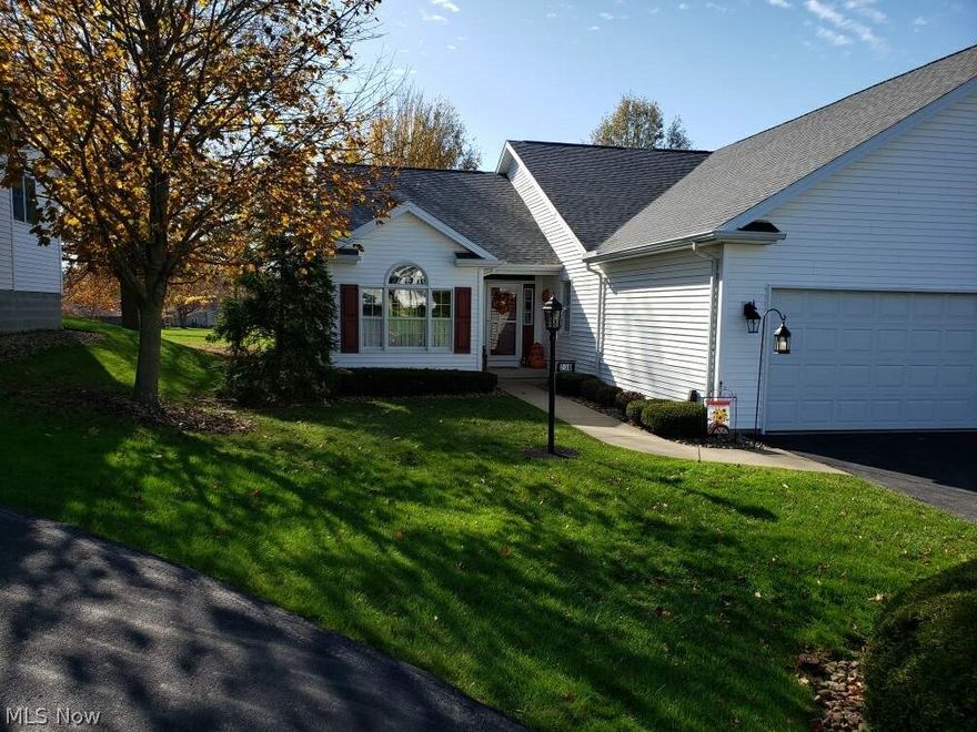 Over 2000 sq. ft. in this spectacular three bedroom cape cod condo overlooking the first hole of Cranberry Hills Golf Course.  The open foyer welcomes you and features Hickory hardwood flooring.  The Hickory flooring is carried throughout the the large kitchen with an island, all appliances, and eating space with vaulted ceiling, living room with gas fireplace, hallway and master bedroom.  French doors in the living room allow you to walk out and sit on your brick, enlarged patio and enjoy the outdoors or watch the golfers.  The master bedroom features your private master bath and walk in closet.  Second bedroom, full bath and laundry room with stationery tub and closet complete the first floor.  The third bedroom, loft area on the second floor is open with a double closet  Overhead lighting has been added along with some motion lighting so no more looking for switches in the dark.   All closets have professionally installed organizers.  The first floor freshly painted in spring, 2020