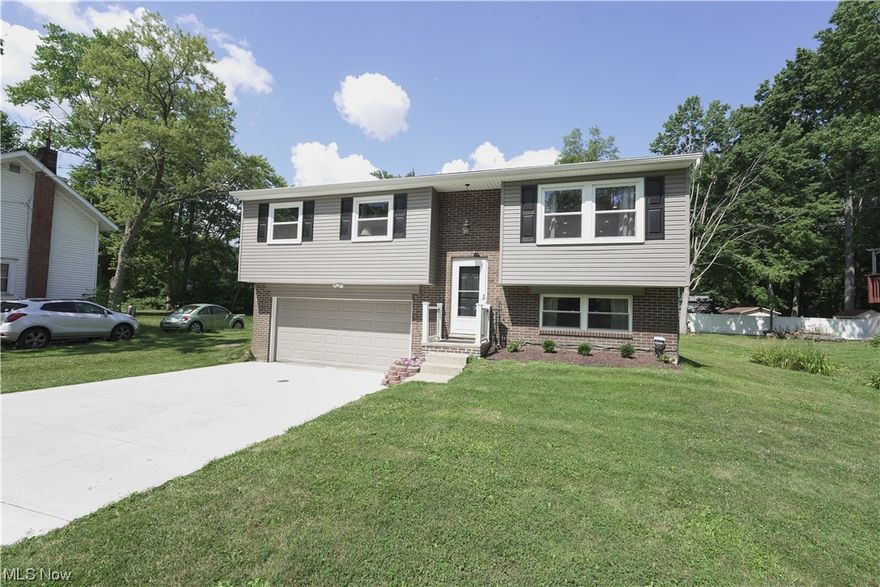 Welcome to 3422 Hiwood Ave in Stow, OH! This charming bi-level home offers a comfortable and inviting living space, complete with 3 bedrooms and 1 bath. As you enter the home, you will be greeted by a spacious living room with plenty of natural light, perfect for gatherings with family and friends. The adjacent dining area is ideal for enjoying meals together or hosting dinner parties. The kitchen is efficiently designed with ample cabinet space, allowing for easy meal preparation and storage. The upper level of the home features three well-appointed bedrooms, providing a peaceful retreat for everyone in the household. The bathroom is conveniently located nearby for added convenience. Downstairs, you will find a finished basement, presenting endless possibilities for use as a recreational room, home office, or additional storage space. Outside, a large backyard and spacious deck offers privacy and a great area for outdoor activities or relaxing in the fresh air. With its convenient loc