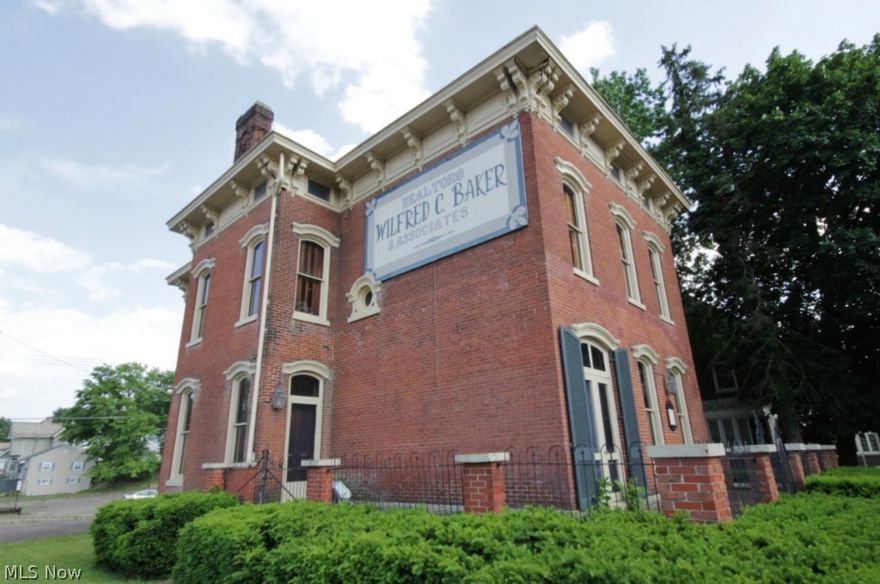 Located on a hard corner at the intersection of SR 60 (Adair Avenue) and Maple Avenue. According to ODOT, there are over $29,000 vehicles that pass through per day on this 4 lane both ways intersection. Nearby retail include Olive Garden, Red Lobster, Gas Stations, Varied Retail shops &  fast food chains (McDonalds, Wendy's, Taco Bell) that are located within a 1/2 mile or less. The Genesis Hospital, Walmart & Kmart are located within 2 miles or less. Ohio University Zanesville is also within only a few miles, directly off the State Route at this intersection.  Excellent signage on the side of the building with high visibility!  This classic brick building has beautiful wood trim and is situated on an oversized lot with private parking. Property is zone C-4 (Highway Commercial) and offers lots of opportunity for office space or other potential retail use. If you are needing office space, retail with high visibility from all directions, this one is sure to please you.