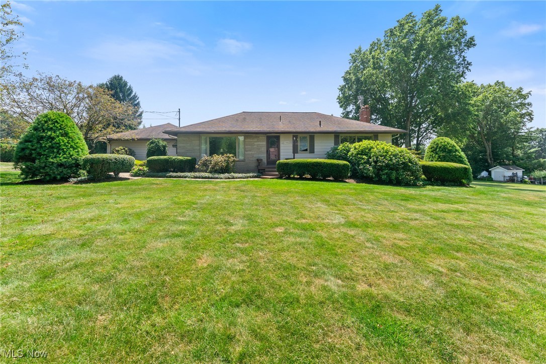 Ranch with Exceptional Indoor & Outdoor Space This 3-bedroom, 2-bath ranch offers a perfect blend of comfort, space, and functionality on a generous 0.82-acre lot in a desirable Hubbard Township neighborhood. The main level features 1,490 sq. ft. plus over 1,000 sq. ft. of finished space in the basement. A spacious living room is filled with natural light from 2 large picture windows. Original hardwood floors lie beneath the carpet, ready to be revealed. The bright, open kitchen offers a counter-height breakfast bar, large eat-in dining area, and a built-in desk/coffee bar. Each bedroom has double closets; two include built-in desks—ideal for working from home, studying, or gaming. The finished basement includes a full bath with shower, a large rec/family room with gas fireplace, and 2 additional finished rooms—great for an office, hobby room, or gym. Garage lovers take note: two attached double garages—one finished with drywall, epoxy stone flooring; the other heated—perfect for car enthusiasts, DIYers, or workshop needs. Enjoy the maintenance-free composite deck off the kitchen or entertain on the brick patio with built-in gas grill. Extras: concrete driveway, manicured landscaping, convenient first floor laundry area, forced warm-air gas heat, central A/C, gutter guards, wiring for generator. A rare combination of indoor comfort and outdoor accommodations! ** See floor plan in photo gallery for layout and room dimensions.