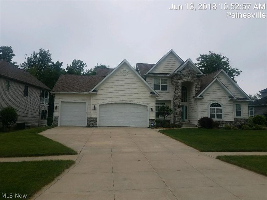 What a great deal!!!!  4 bedroom 2 1/2 bath 2 story home with open floor plan!!!  Custom kitchen that opens into cathedral living room with fireplace. Formal dining room, first  floor office, half bath, office and master suite. Nicely landscaped back yard. 3 bedrooms and full bath upstairs. Full basement and 3 car garage. What a great location!!!!! Walk to Lake Erie and private beach and pavilion!!!!