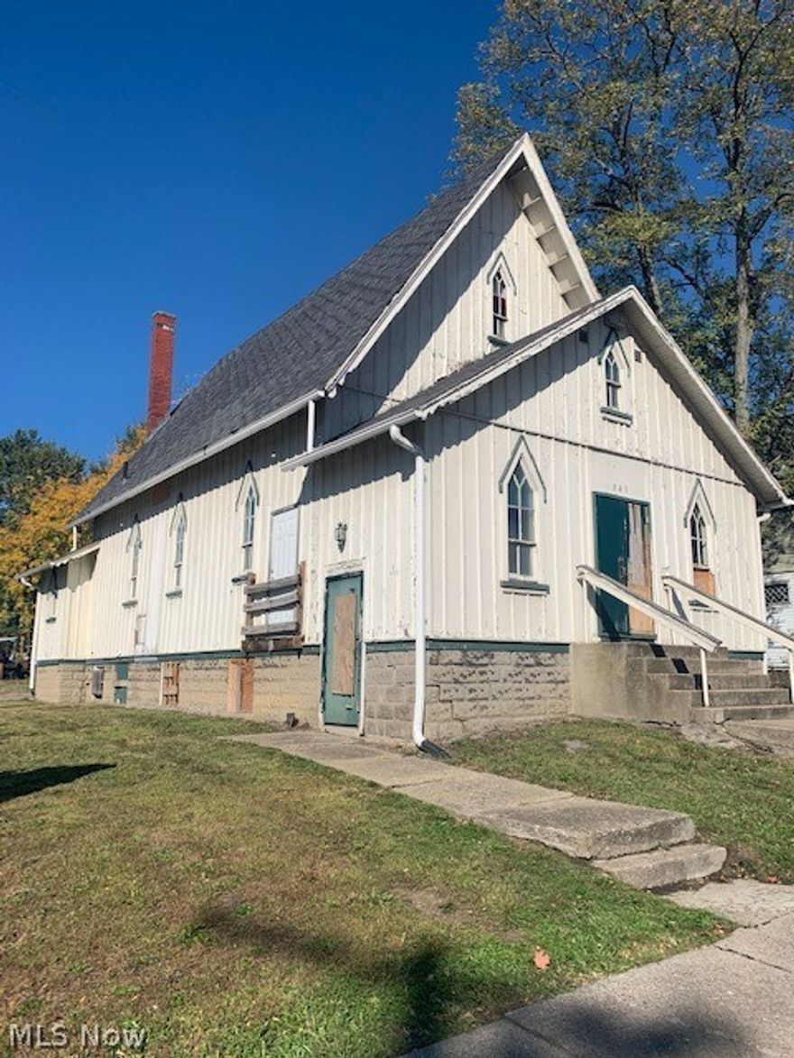 Investor Ready!  Looking for the perfect space to anchor your business near Bridge Street?  Or finding that one of a kind Vacation rental?  This former church is located just one block from Historic Bridge Street in the Ashtabula Harbor as well as just two blocks from beautiful Walnut Beach.  The charming shops, restaurants and wine bars are in your backyard. Come inside and see the history, character and potential of this unique property.  A full unfinished basement with two points of egress allows for even more space for your future needs.  The property is being sold "As Is" -there are no working utilities at this time.
